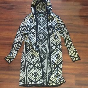 Long open front patterned sweater.